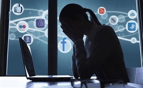 A woman feeling devastated after reading something on her social media profile
