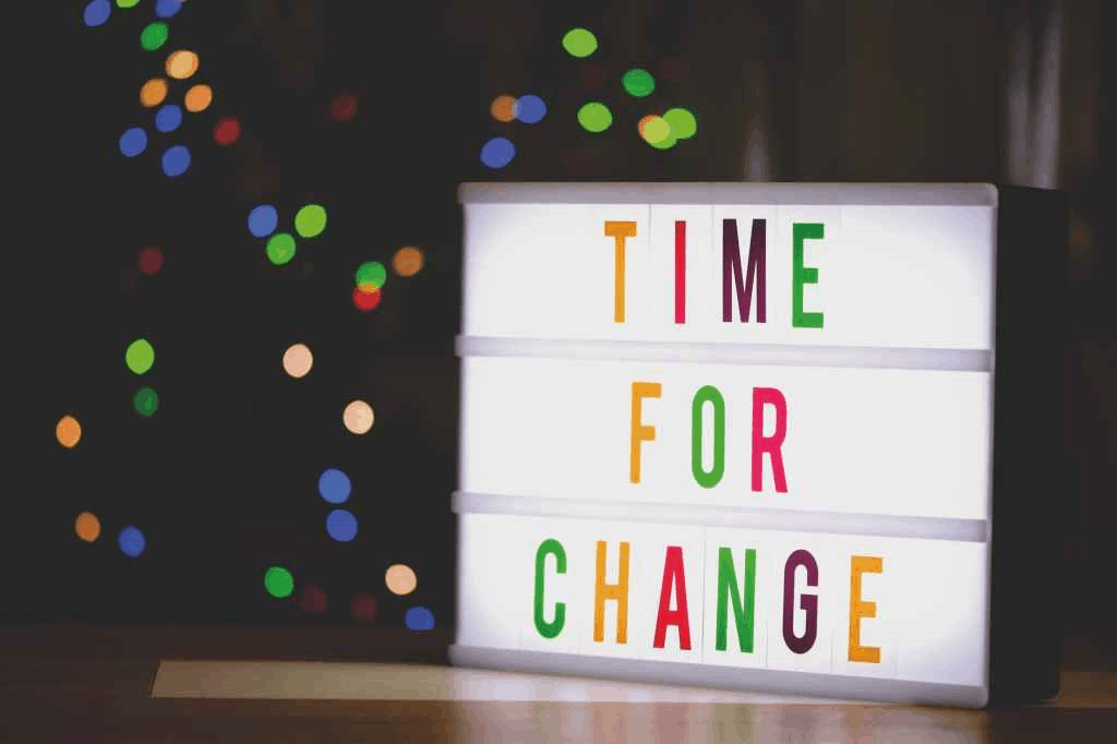 A colorful sign saying TIME FOR CHANGE and the neuro linguistic programming is helpful 
