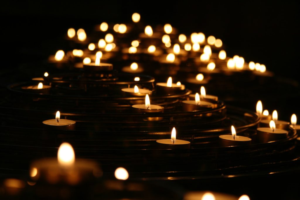 Spiritual candles lightning in the dark