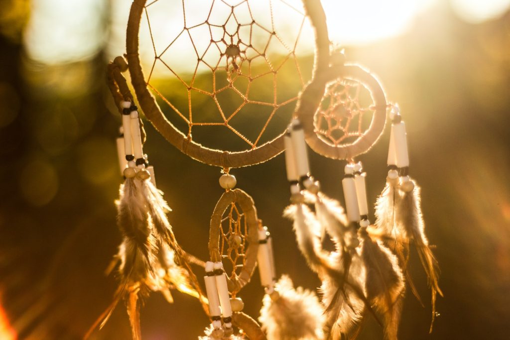 A dream catcher, signifying the 5th dimension of spirituality