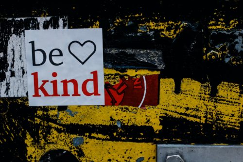 A sign calling us to be kind, emphasizing the importance of interpersonal sensitivity