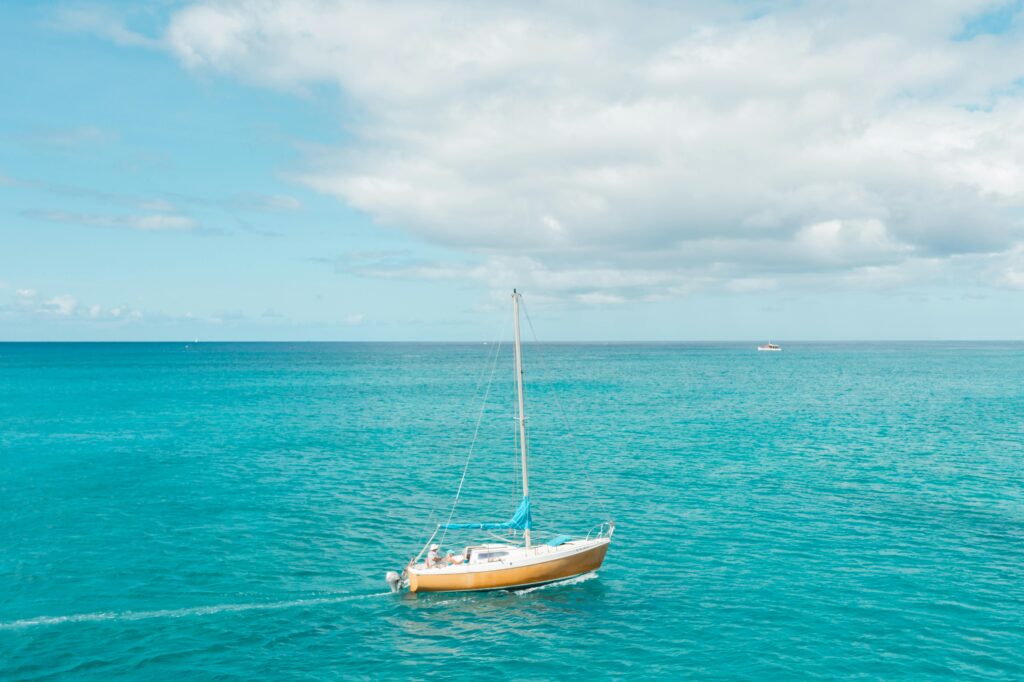 Beautiful calm sailboat sailing at sea symbolizing our lives and destiny - 50 Best Destiny Quotes